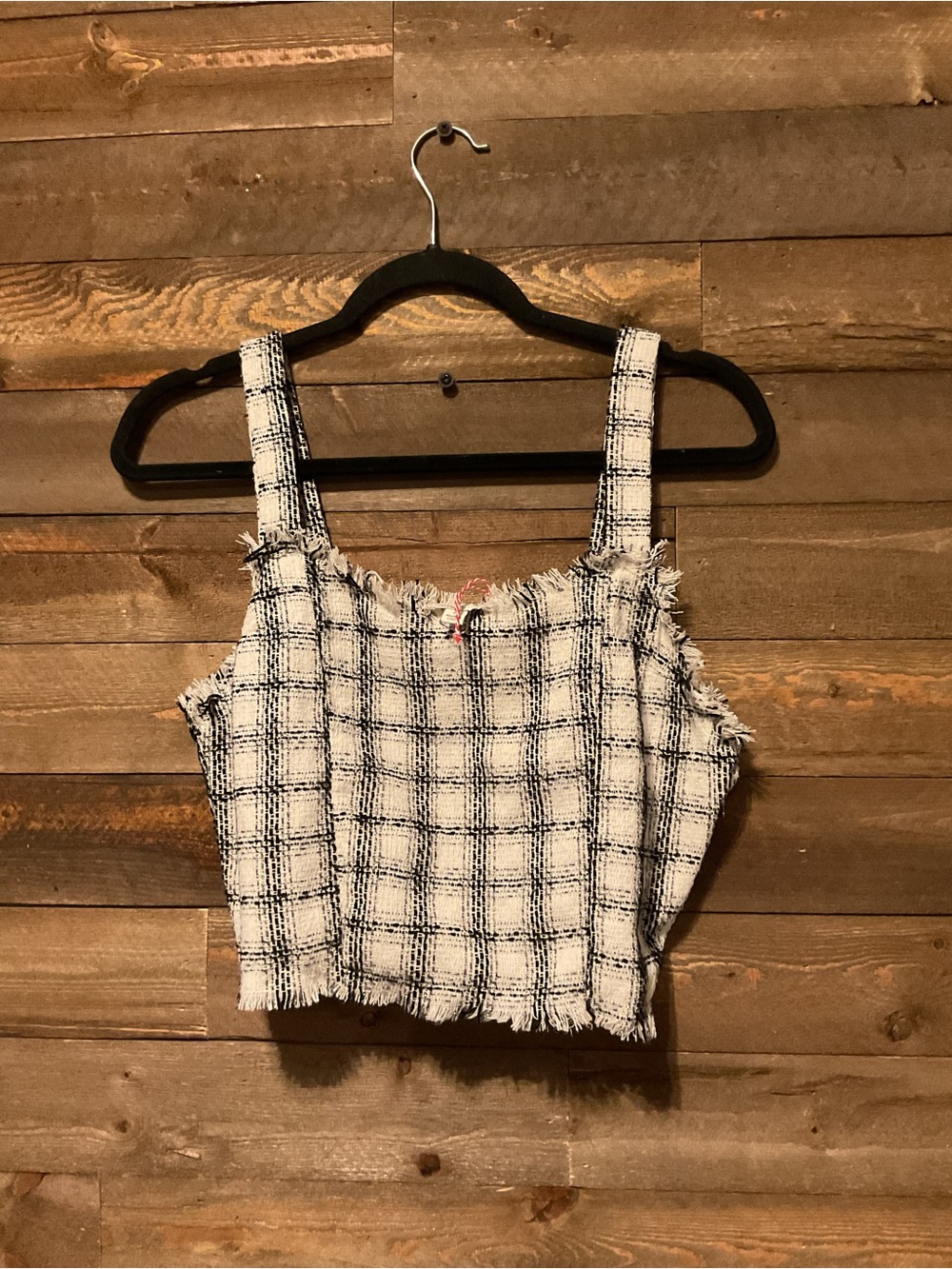 The Umgee Plaid Tweed Coco Top and Matching Skort is a stylish and versatile out